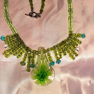 Lampwork green flower pendant, glass seed necklace